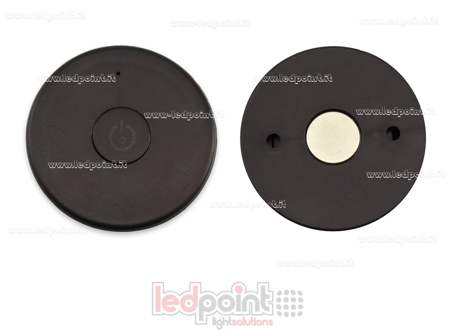 Telecomando portatile monocromatico, nero, RF 2.4G, con magnete sul retro e fori per fissaggio a muro Telecomando portatile monocromatico, nero, RF 2.4G, con magnete sul retro e fori per fissaggio a muro